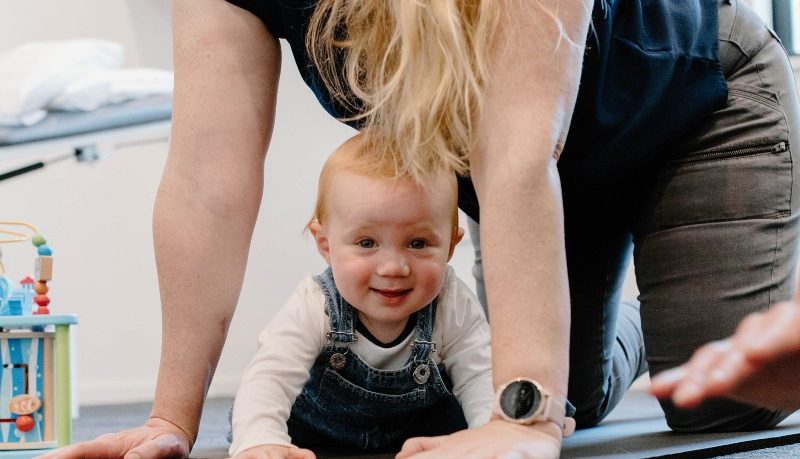 Woman returning to exercise safely after giving birth